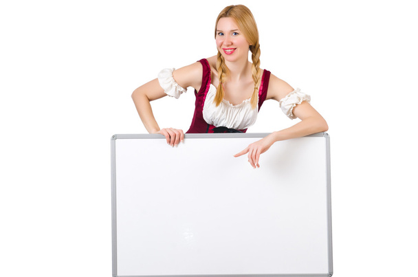 Woman in bavarian costume with poster - Foto, imagen