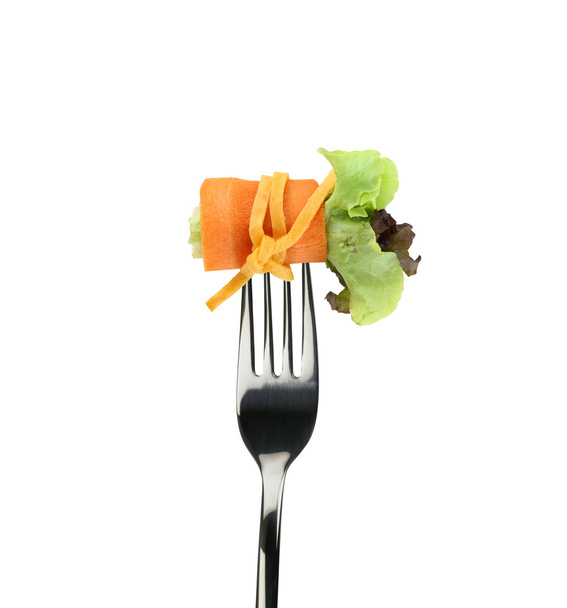 roll salad on fork isolated on white. - Foto, Imagem