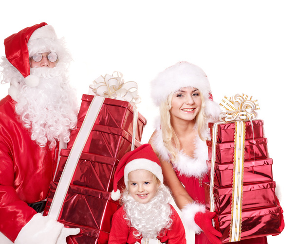 Santa Claus familia con niño celebración apilar caja de regalo
.. - Foto, imagen