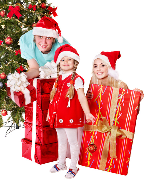 Happy family in santa hat holding gift box. - Photo, Image