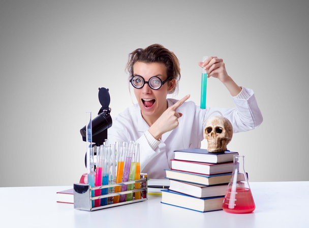 Crazy female chemist in lab - Photo, Image