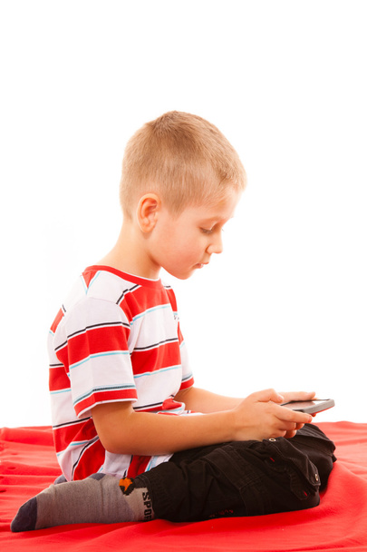 Little boy playing games - Fotó, kép