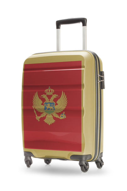 Valigia con la bandiera nazionale su di esso - Montenegro - Foto, immagini
