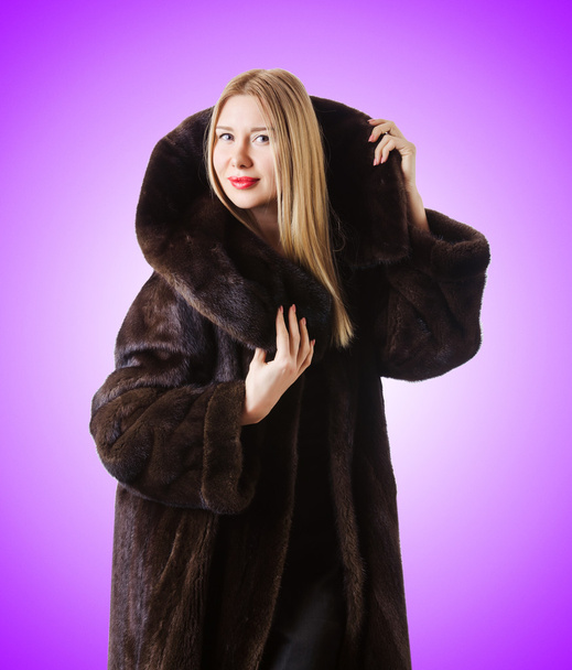 Tall model wearing fur coat - 写真・画像