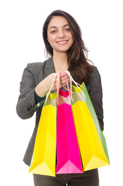 Atraktivní žena s nákupními taškami izolované na bílém - Fotografie, Obrázek