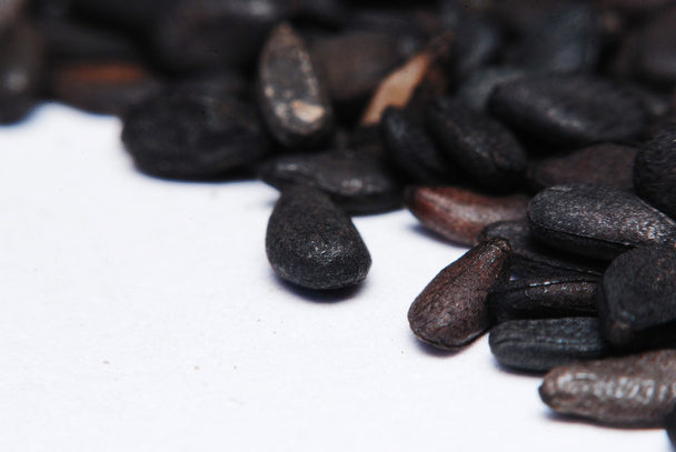 Pile of black sesame seeds isolated on white background - Photo, Image