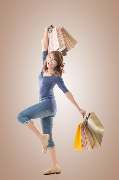 Cheerful shopping woman - Fotografie, Obrázek