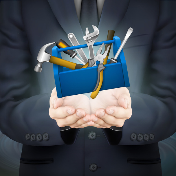 businessman holding tools box - Вектор,изображение