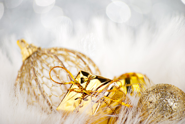 Golden christmas balls on abstract background - Foto, Imagem