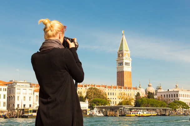 Female tourist taking photo of Venice. - Foto, afbeelding