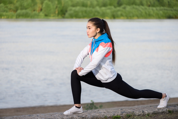 Asian woman doing exercise at the morning outdoor - Foto, Bild