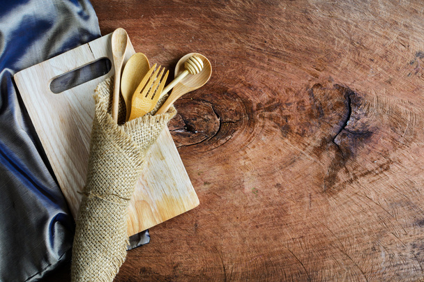 Wooden utensil in kitchen on old wooden background with copy space - Фото, изображение