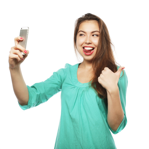 Pretty teen girl taking selfies - Foto, Imagem