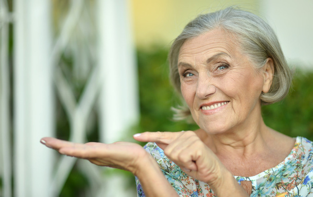 Older woman pointing - Photo, Image