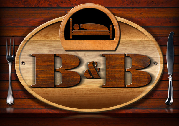 Bed and Breakfast - jel ágy és evőeszközök - Fotó, kép