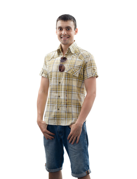 young man in denim shorts and a shirt - Foto, Imagem