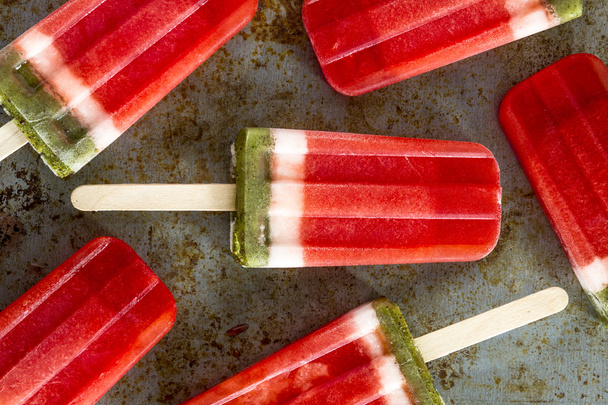 Frozen Watermelon and Kiwi Popsicles - 写真・画像