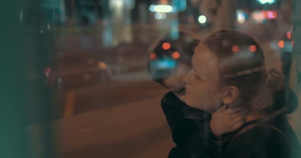 Boy Hugging Mother while Waiting for the Bus - Кадры, видео