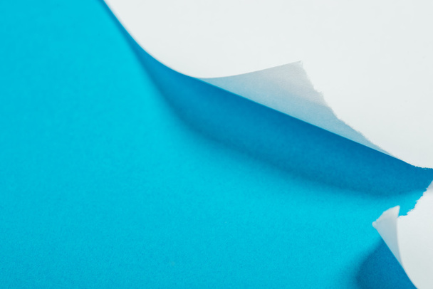 White color paper sheets  over the blue background - Foto, Bild