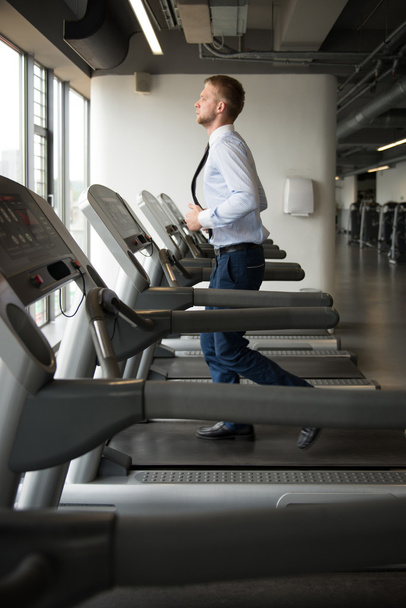 Businessman Exercising On A Treadmill - Zdjęcie, obraz