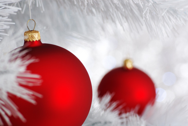 Red balls - Christmas decoration on silver bokeh - Foto, Imagem