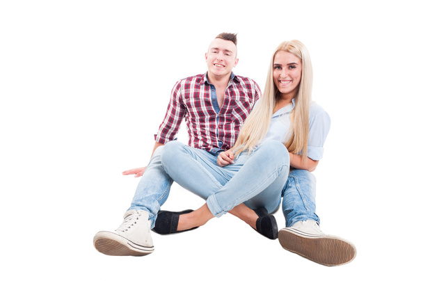 Young and relaxed couple sitting on the floor - Fotografie, Obrázek