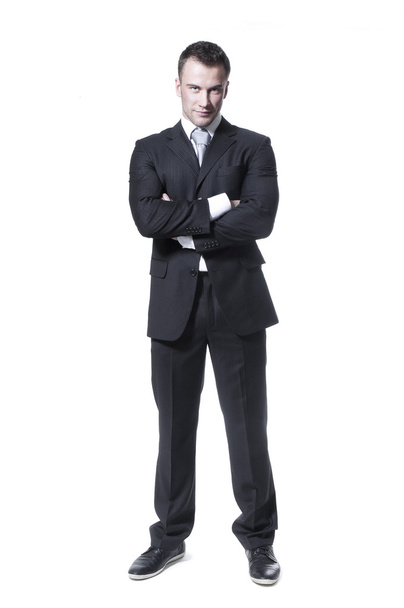Умный молодой бизнесмен в черном костюме
 - Фото, изображение