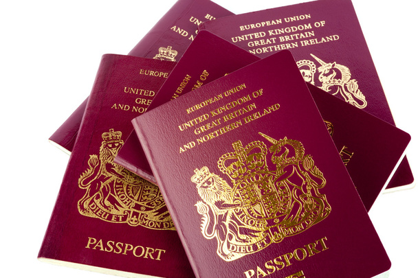 Passaportes sobre fundo branco
 - Foto, Imagem