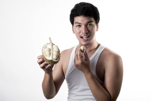 Azjatycki człowiek jedzenie Durian - Zdjęcie, obraz
