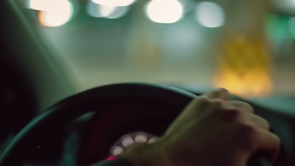 Hands of a man driving a car. Close up - Felvétel, videó