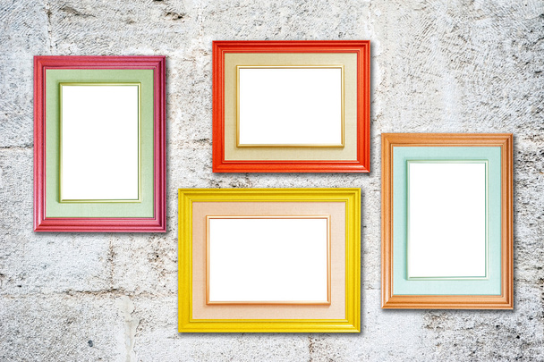 Four multicolored photo frames on the retro wall - Fotó, kép