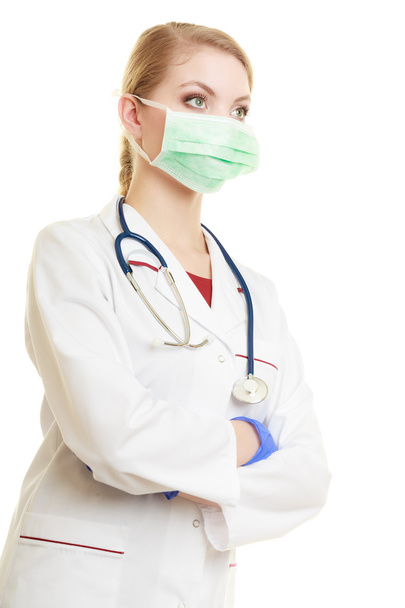 lekarz w twarz maskę chirurgiczną pozowanie - Zdjęcie, obraz