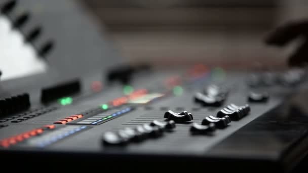 Man mixing sound at professional sound mixer - Materiaali, video
