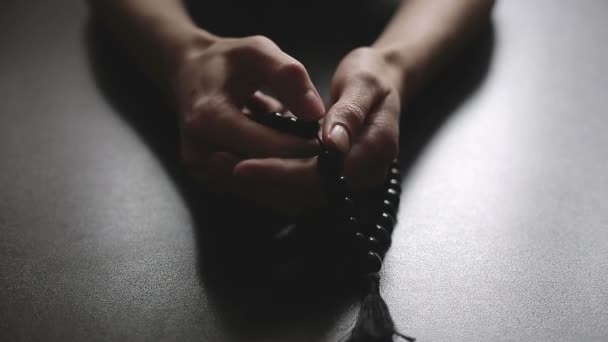 Woman praying with rosary - Footage, Video