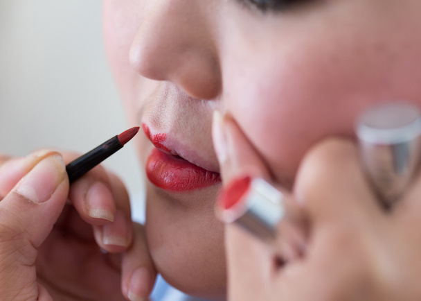 red lipstick of makeup with cosmetic for woman - Φωτογραφία, εικόνα