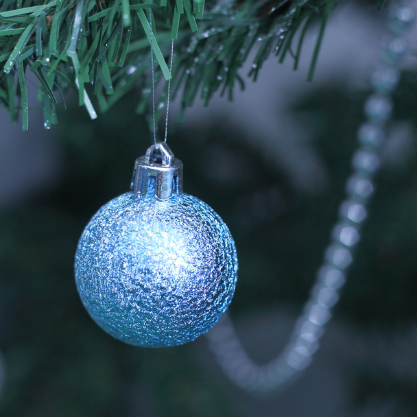 Blue bauble on the Christmas tree - Foto, Imagem