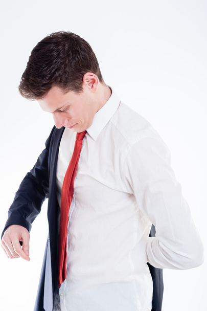 Young businessman dressing up - 写真・画像