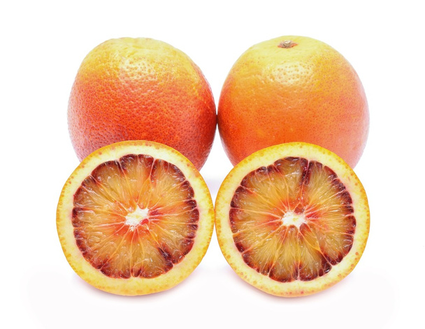 Blood red oranges isolated on white background - 写真・画像