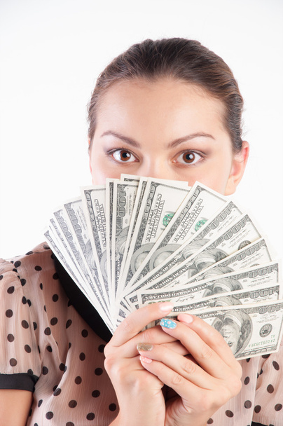 girl hiding her face behind an  money - Foto, Bild