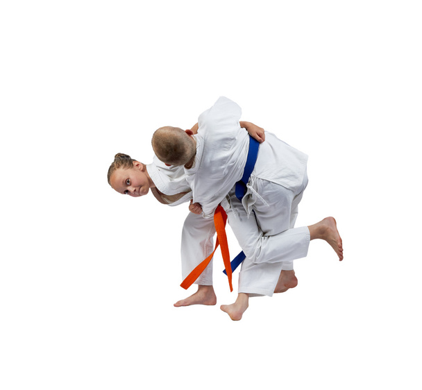 In judogi two athletes are doing judo throws - Photo, Image