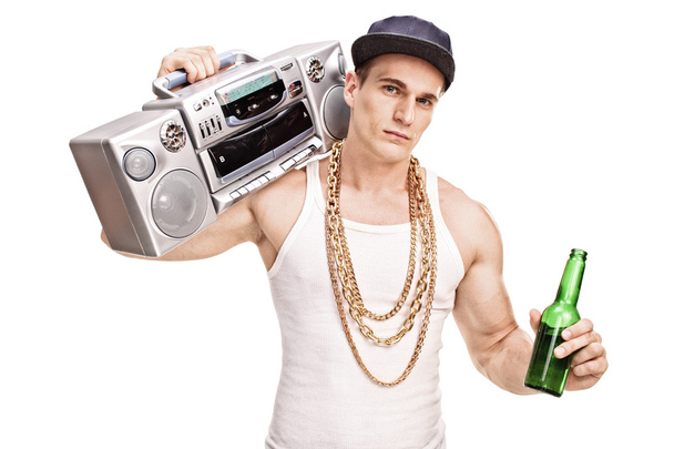 Rapper carrying a ghetto blaster and holding beer  - Foto, afbeelding