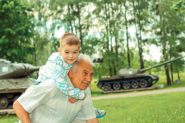 Grandfather with his little grandson on excursion - Photo, Image
