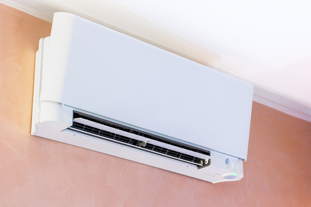 air conditioner installed on the wall - Фото, зображення