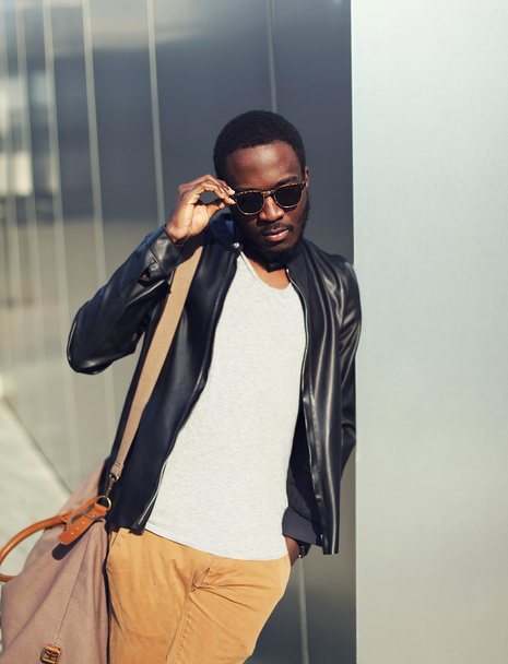 Fashion portrait of elegant young african man wearing a sunglass - Фото, зображення