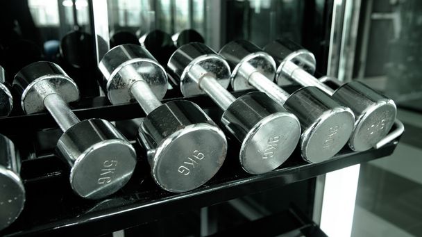 Dumbells  row in gym  - Photo, Image