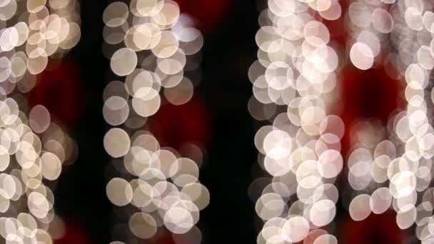 Defocused LED-es részecske fények villogó éjjel - Felvétel, videó