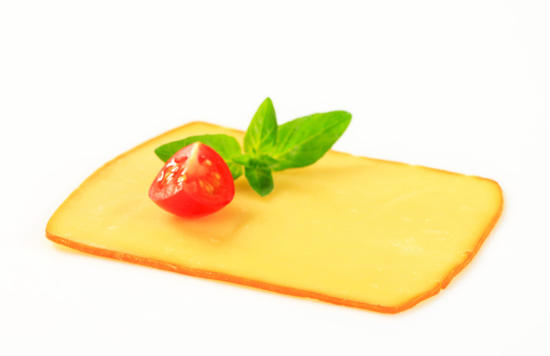 Rebanada de queso ahumado
 - Foto, imagen