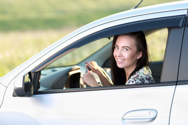 Young woman driving  car - Photo, Image