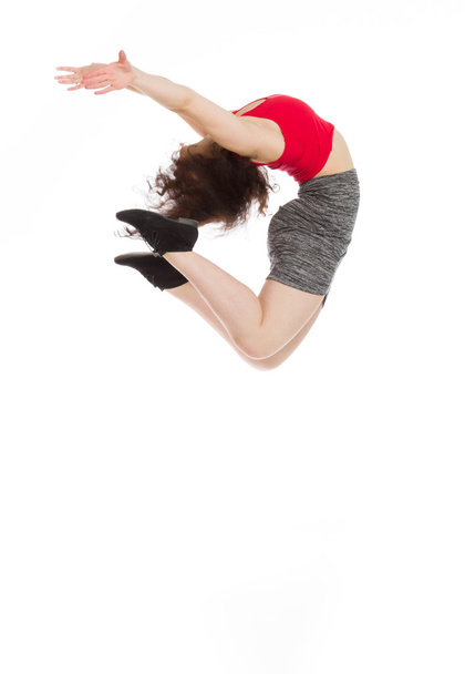 Beautiful Model jumps in the air - Фото, изображение