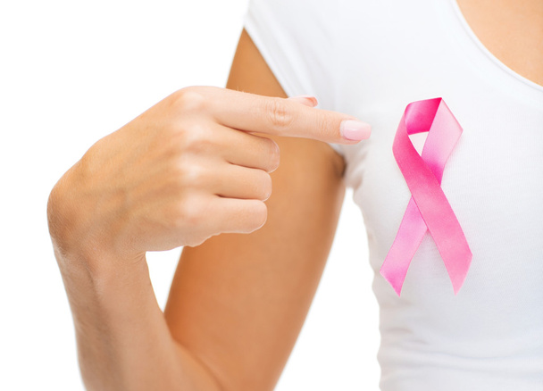 woman with pink cancer awareness ribbon - Valokuva, kuva